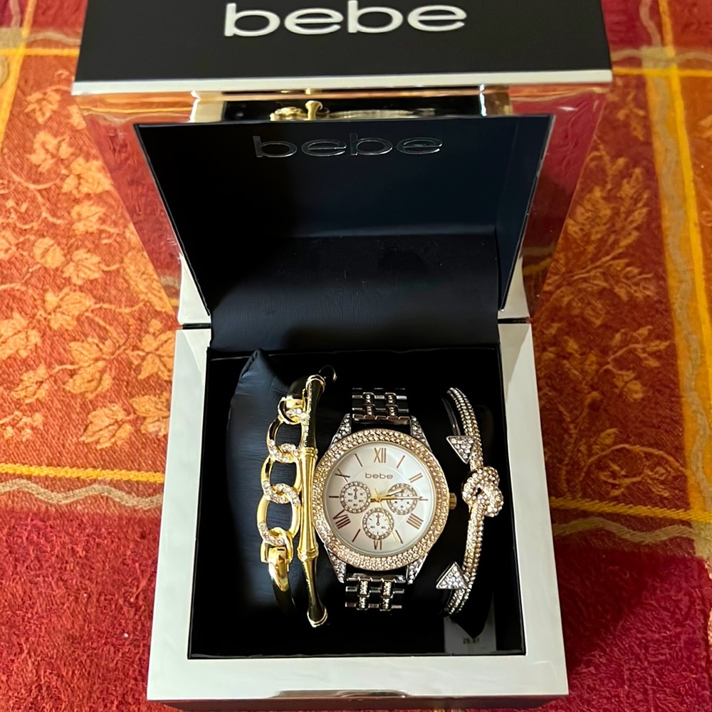 Bebe ladies watch with bracelets